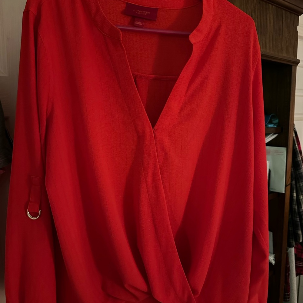 Jennifer Lopez red simmering blouse